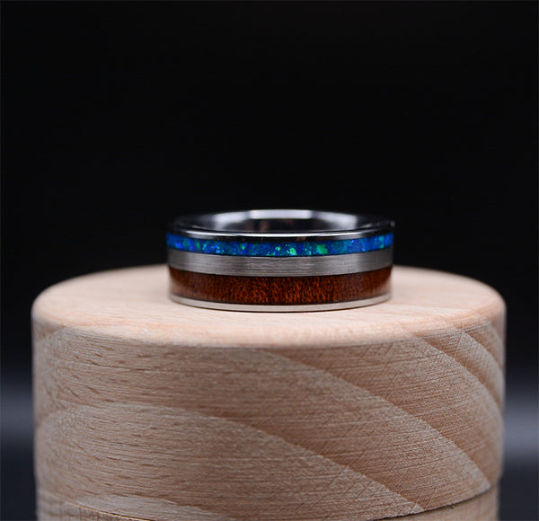 Sleek and Stylish: Men's Tungsten Carbide Wood Wedding Ring with Blue Opal Inlay
