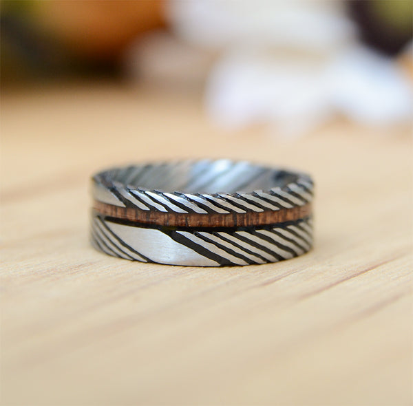 Match His and Hers Damascus Steel Pattern Wedding Band Sets with Koa Wood Inlay