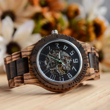 A mechanical wooden watch made by hand by Urban Designer.