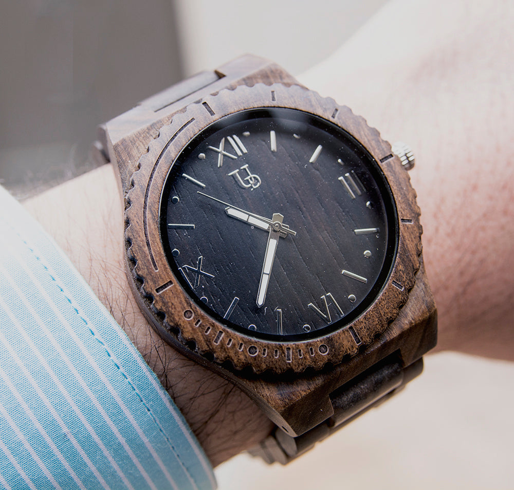 A dark watch made of wood with Japanese Movement from Urban Designer.